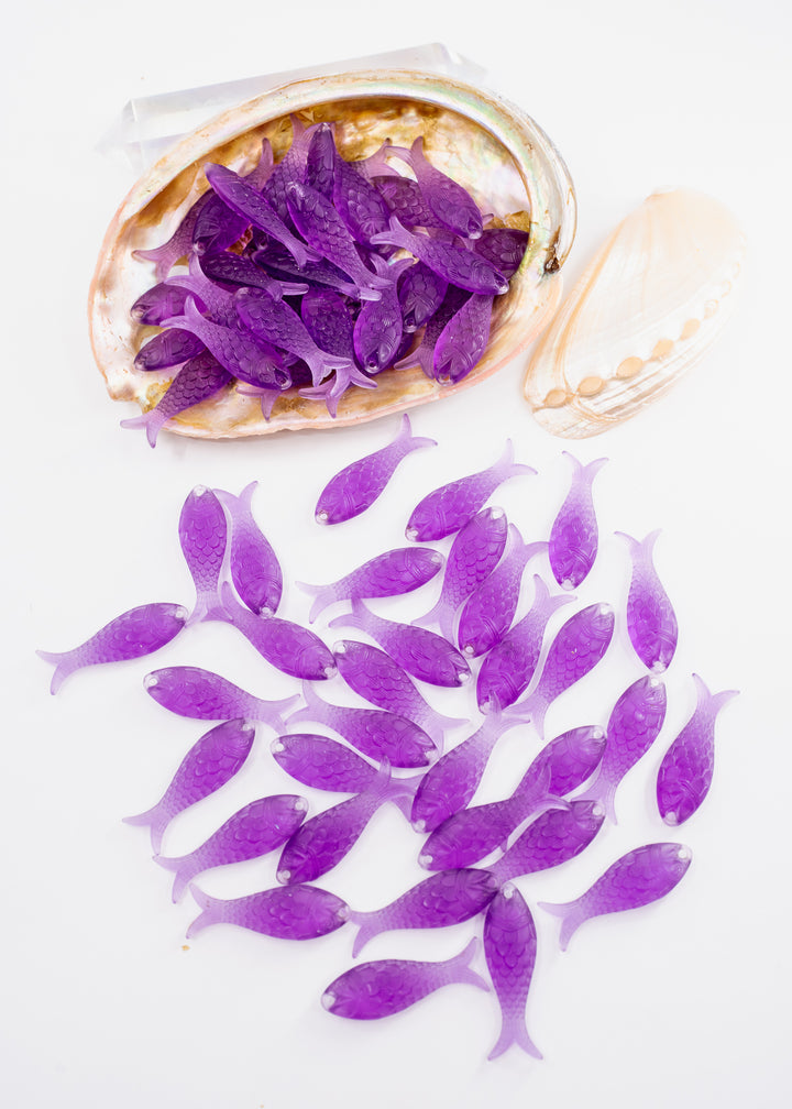 Amethyst Purple German Resin Fish Charm featuring a realistic 27mm sardine pendant. Perfect for ocean charms, beach jewelry, fisherman aesthetic accessories, coastal earrings, nautical jewelry, mermaidcore designs, and handmade jewelry making.