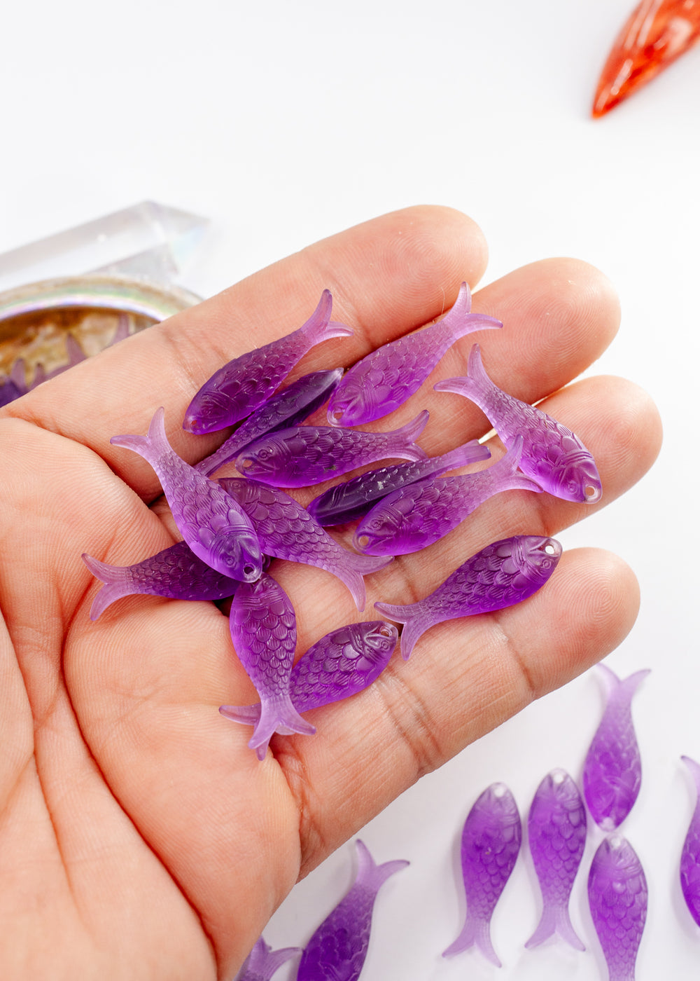 Amethyst Purple German Resin Fish Charm featuring a realistic 27mm sardine pendant. Perfect for ocean charms, beach jewelry, fisherman aesthetic accessories, coastal earrings, nautical jewelry, mermaidcore designs, and handmade jewelry making.