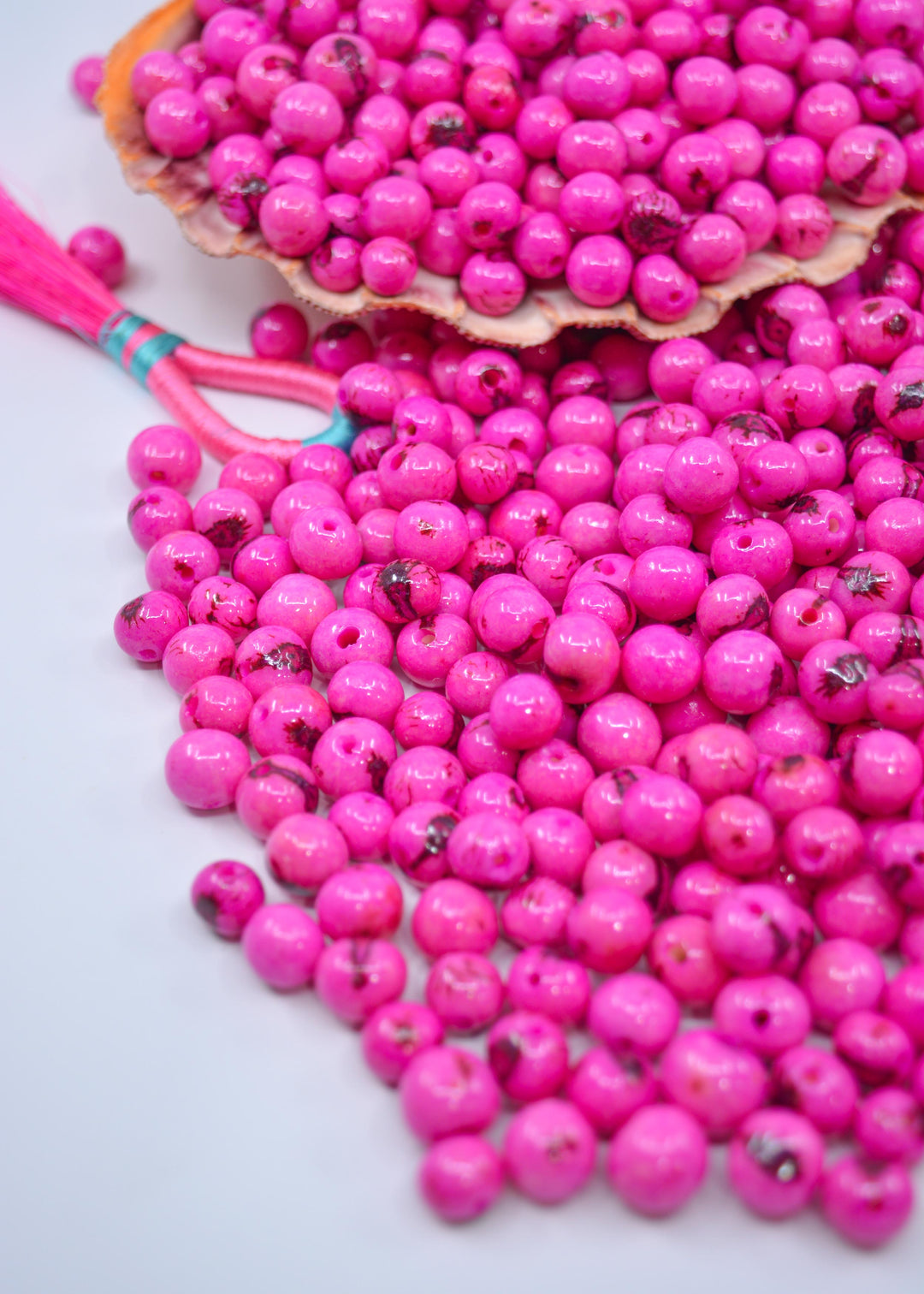 Great assortment of pink acai beads for jewelry making and crafts.