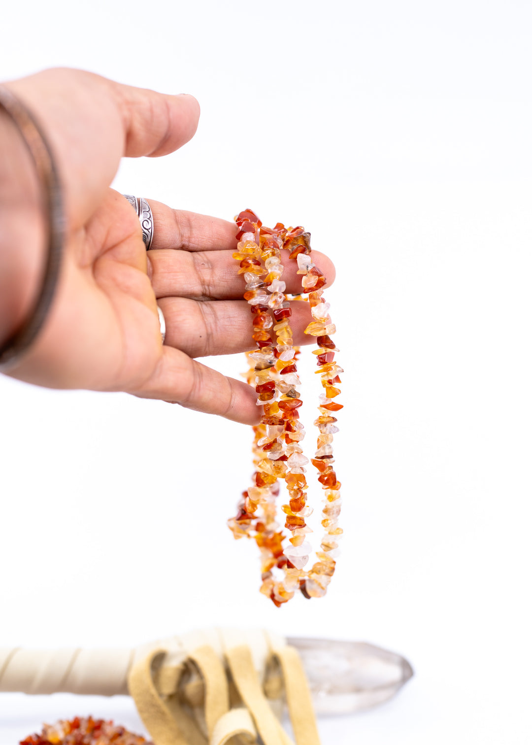 Natural Carnelian chip beads featuring warm orange and red semi-precious gemstone chips on a 34 inch strand. Perfect for boho jewelry making, crystal-inspired designs, bracelets, necklaces, malas, earrings, and artisan gemstone creations.