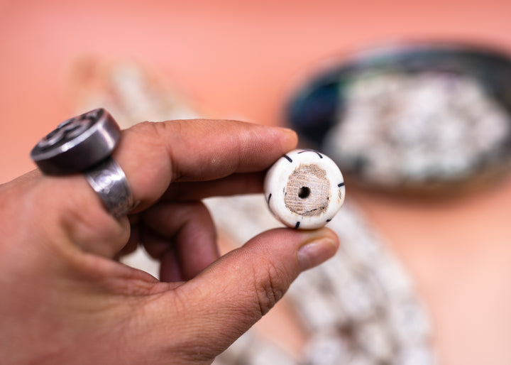 Hand-carved African bone beads handmade in Kenya from recycled cow bone featuring bold tribal X patterns and oversized barrel shapes. Perfect for boho jewelry making, statement necklaces, leather cord projects, macrame, braids, and artisan designs.