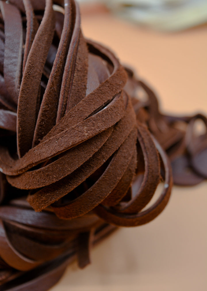 a close-up of USA made Deerskin Leather Straps
