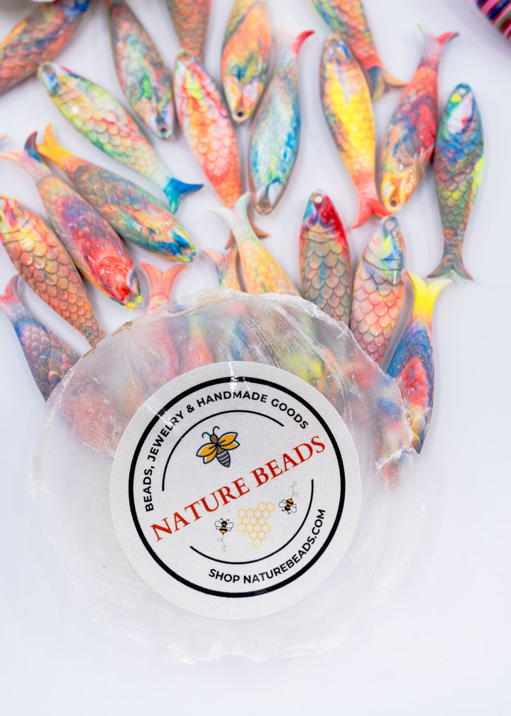 Nature Beads carries small batch German resin Coral Reef German Resin Fish Charm, 48mm Sardine Pendant, 1 charm