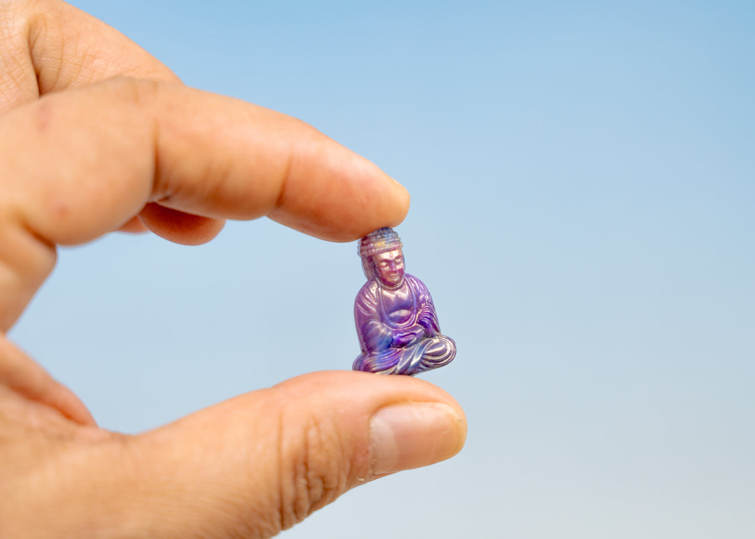 Shop a Galaxy Purple Buddha pendant in 25mm marbled resin. Lightweight sitting Buddha charm for necklaces, malas, meditation and spiritual jewelry.