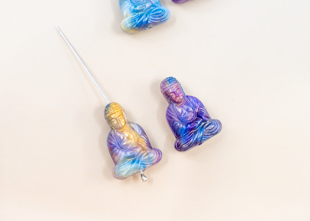 Shop a Galaxy Purple Buddha pendant in 25mm marbled resin. Lightweight sitting Buddha charm for necklaces, malas, meditation and spiritual jewelry.