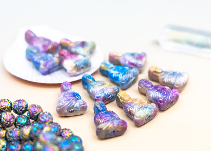 Shop a Galaxy Purple Buddha pendant in 25mm marbled resin. Lightweight sitting Buddha charm for necklaces, malas, meditation and spiritual jewelry.