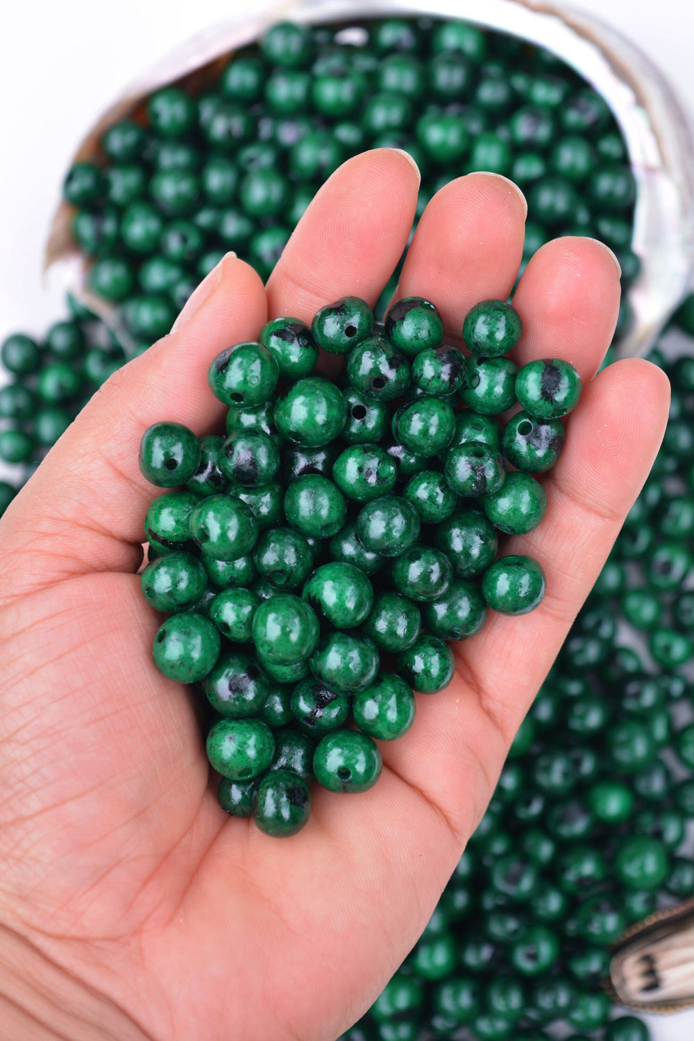 Close Up of Deep Emerald Green Acai Beads