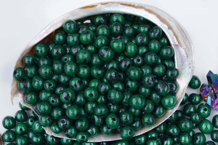 Deep Emerald Green Acai Beads showing markings