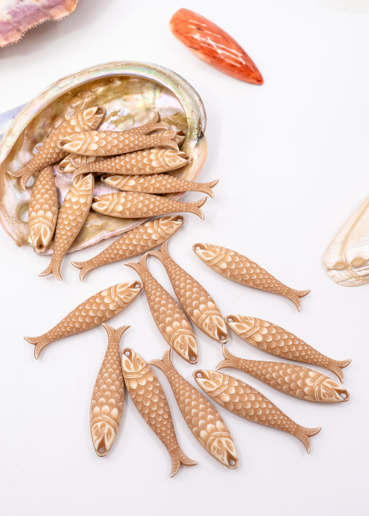 German resin fish charm in Driftwood Beige featuring a 48mm sardine pendant perfect for ocean charms, beach jewelry, fisherman aesthetic accessories, coastal earrings, nautical jewelry, keychains, and seaside-inspired designs.