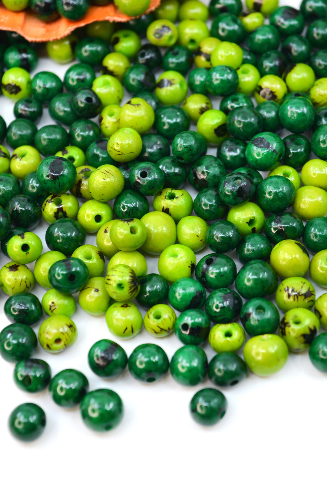 Natural Acai Beads display show casing different sizes of natural beads.