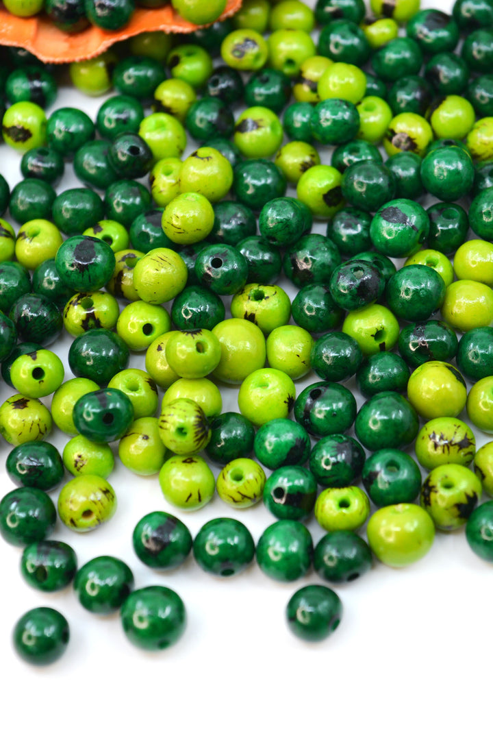 Natural Acai Beads display show casing different sizes of natural beads.