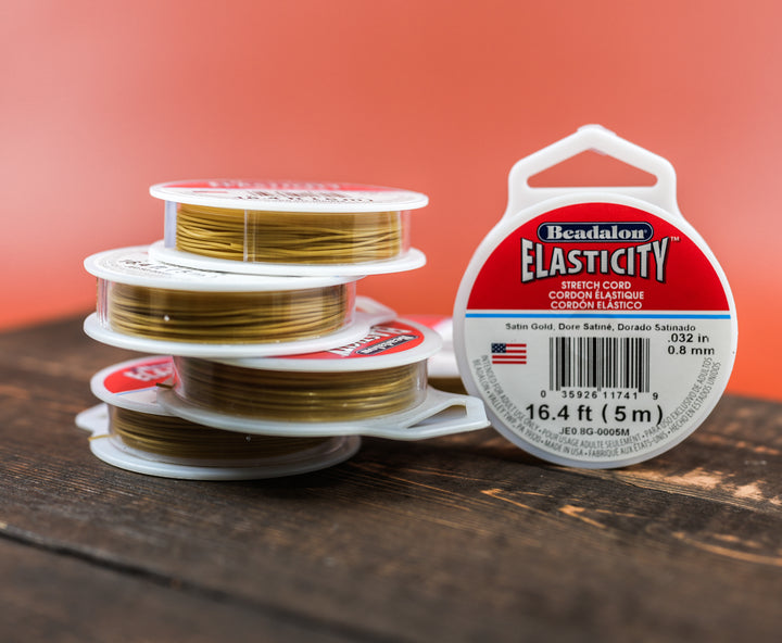 Spools of Gold Elastic Cord for Jewelry making