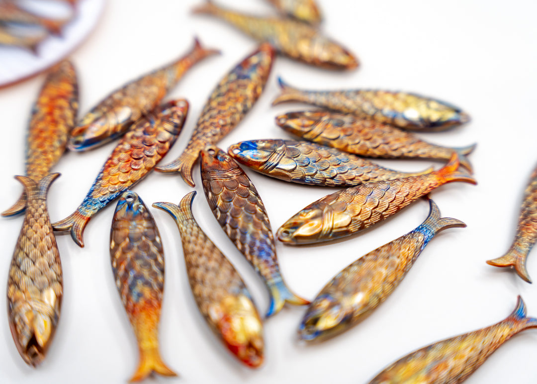 Golden Hour, Bronze German Resin Fish Charm featuring a realistic 48mm sardine pendant. Perfect for ocean charms, beach jewelry, fisherman aesthetic accessories, coastal jewelry, nautical designs, handmade earrings, necklaces, keychains, and artisan jewelry making.