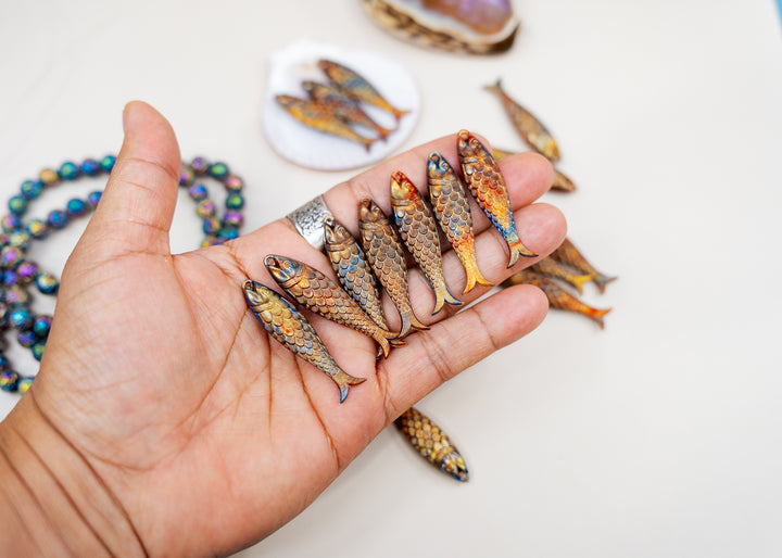 Golden Hour, Bronze German Resin Fish Charm featuring a realistic 48mm sardine pendant. Perfect for ocean charms, beach jewelry, fisherman aesthetic accessories, coastal jewelry, nautical designs, handmade earrings, necklaces, keychains, and artisan jewelry making.