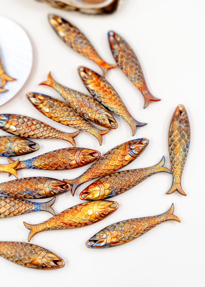 Golden Hour, Bronze German Resin Fish Charm featuring a realistic 48mm sardine pendant. Perfect for ocean charms, beach jewelry, fisherman aesthetic accessories, coastal jewelry, nautical designs, handmade earrings, necklaces, keychains, and artisan jewelry making.