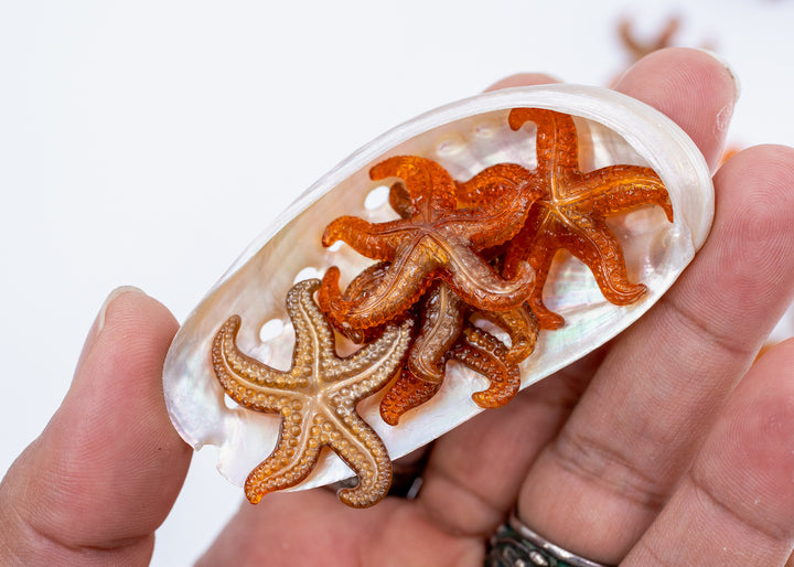 Golden Hour German resin starfish charm with warm amber and bronze marbling. Lightweight 30mm coastal pendant for beach jewelry, ocean-inspired crafts, and DIY jewelry making.