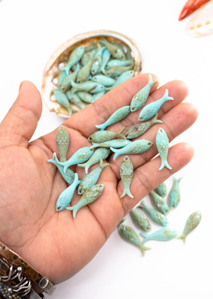 Marble Aqua blue fish charms handmade from glitter German resin featuring marbled sardine pendants perfect for ocean jewelry, mermaidcore accessories, beach fashion, coastal earrings, whimsical summer jewelry, and festival-inspired designs. These fish ocean charms are waterproof and perfect for beach jewelry.