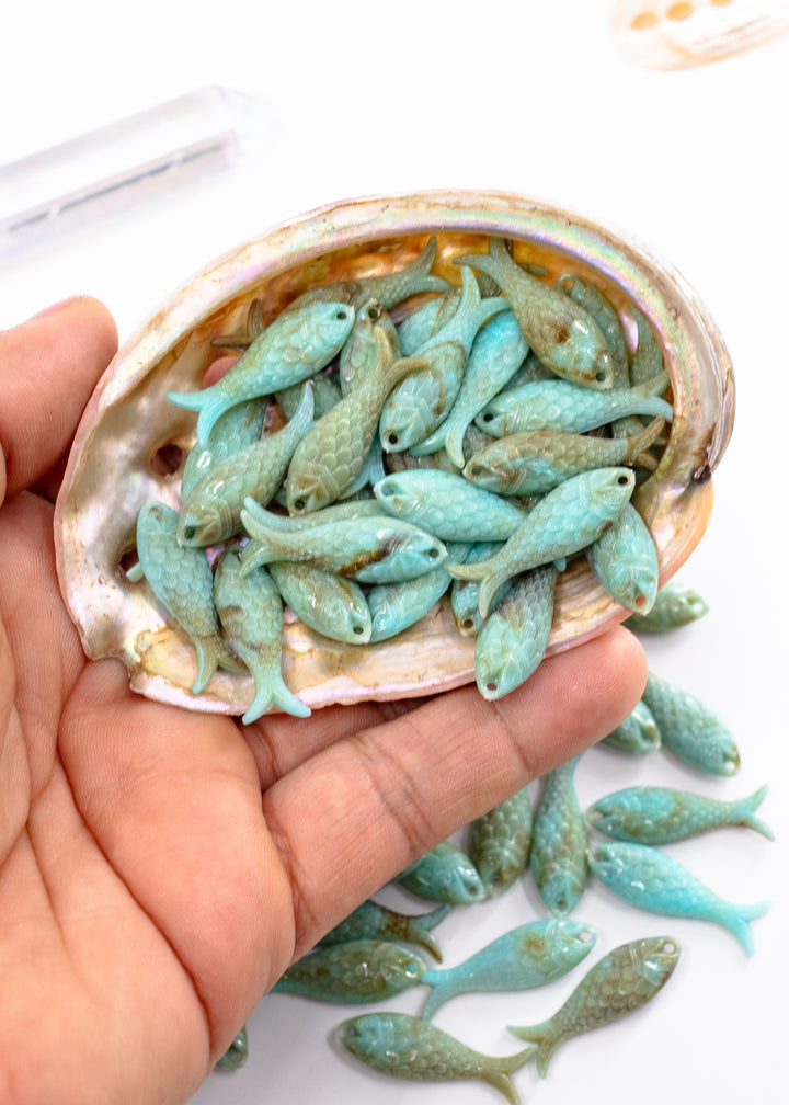 Marble Aqua blue fish charms handmade from glitter German resin featuring marbled sardine pendants perfect for ocean jewelry, mermaidcore accessories, beach fashion, coastal earrings, whimsical summer jewelry, and festival-inspired designs. These fish ocean charms are waterproof and perfect for beach jewelry.
