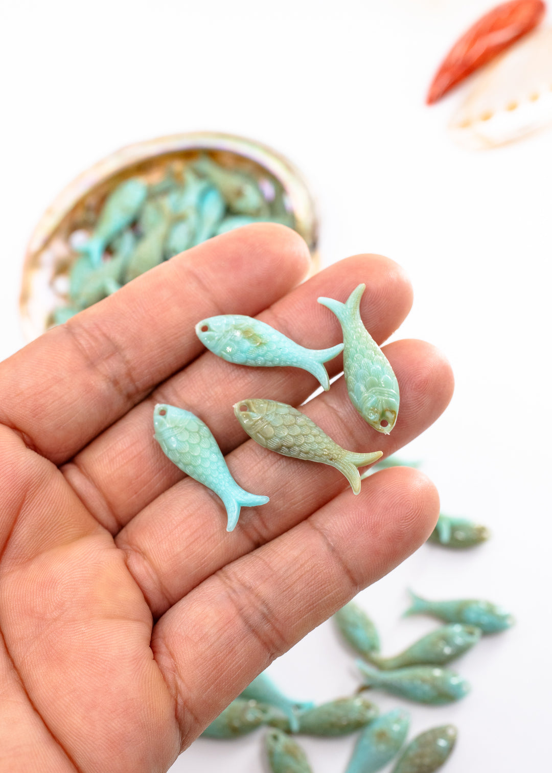 Marble Aqua blue fish charms handmade from glitter German resin featuring marbled sardine pendants perfect for ocean jewelry, mermaidcore accessories, beach fashion, coastal earrings, whimsical summer jewelry, and festival-inspired designs. These fish ocean charms are waterproof and perfect for beach jewelry.