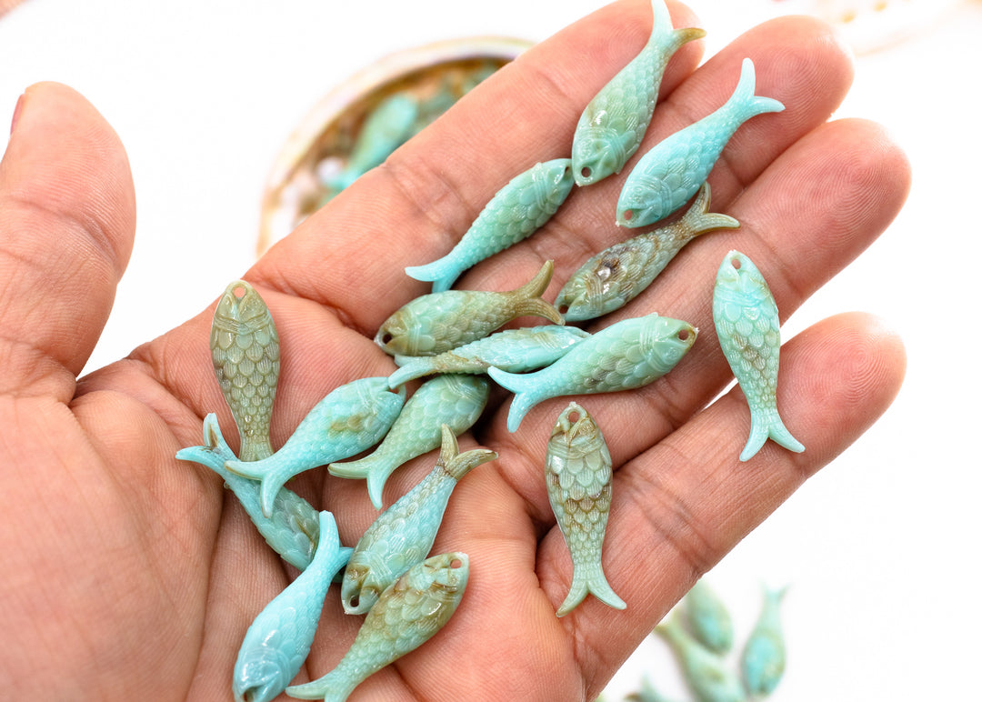 Marble Aqua blue fish charms handmade from glitter German resin featuring marbled sardine pendants perfect for ocean jewelry, mermaidcore accessories, beach fashion, coastal earrings, whimsical summer jewelry, and festival-inspired designs. These fish ocean charms are waterproof and perfect for beach jewelry.