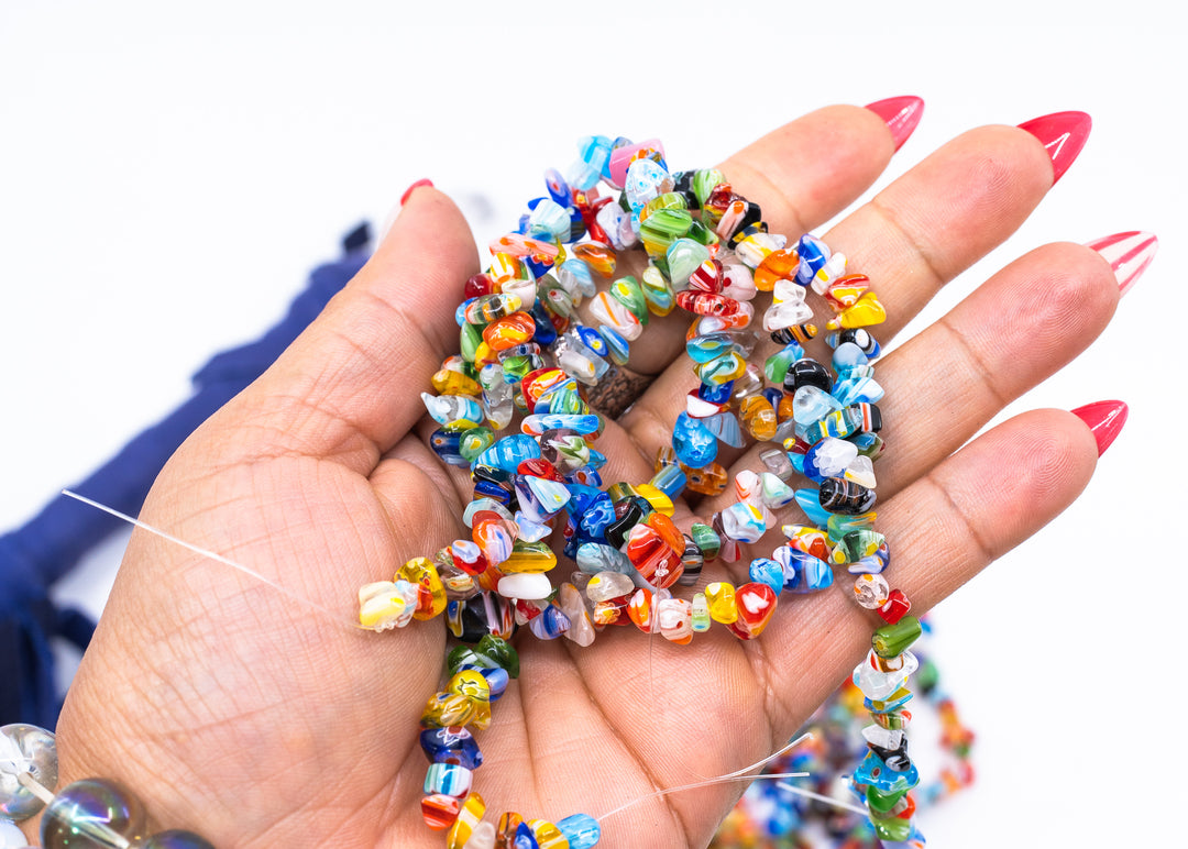 Multicolor millefiori glass chip beads featuring vibrant mosaic-style artisan glass in assorted rainbow colors. Perfect for boho jewelry making, layered necklaces, bracelets, earrings, mixed media art, and eclectic handmade designs.