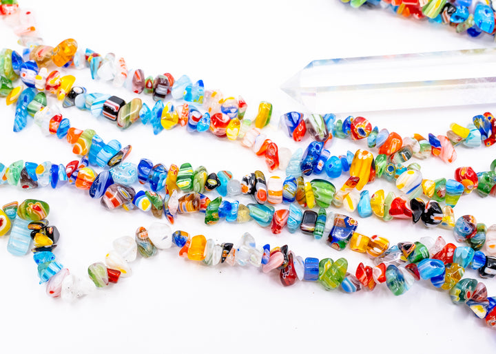 Multicolor millefiori glass chip beads featuring vibrant mosaic-style artisan glass in assorted rainbow colors. Perfect for boho jewelry making, layered necklaces, bracelets, earrings, mixed media art, and eclectic handmade designs.