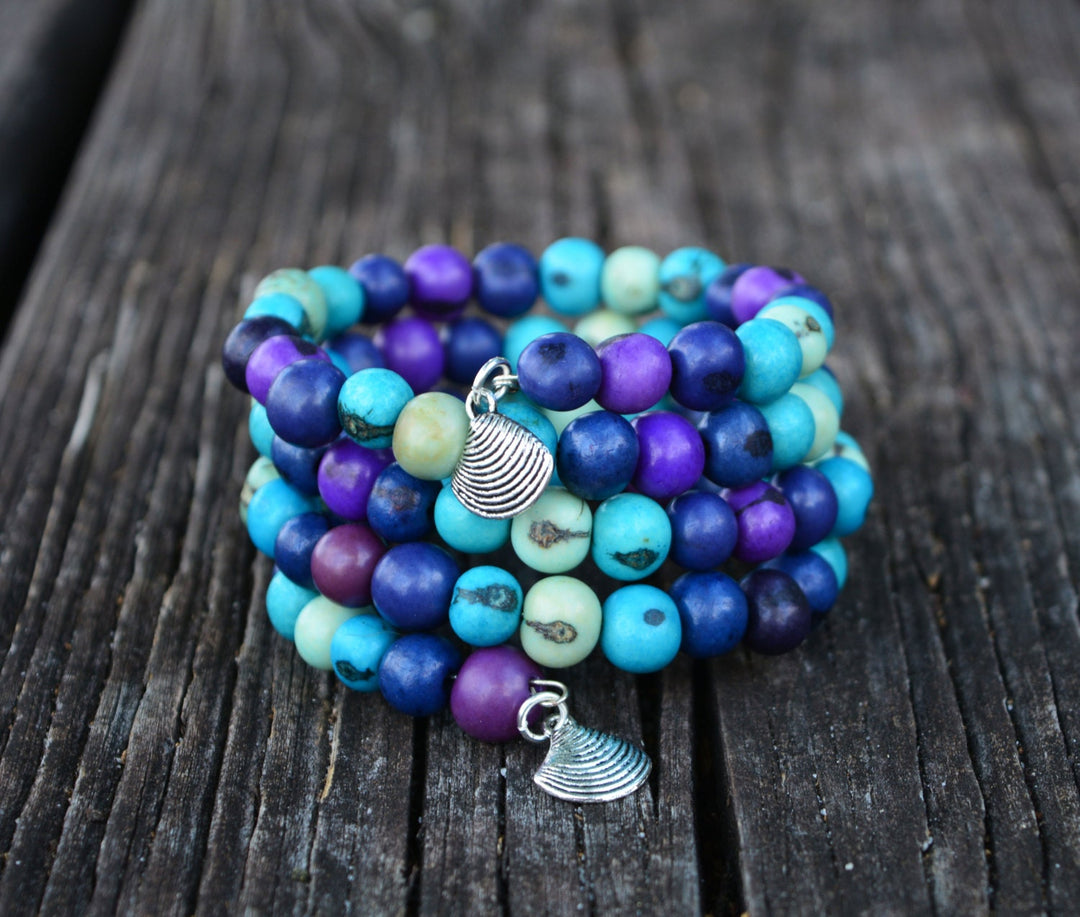 Acai Beads strung in memory wire making a beautiful wrap around the arm natural bead bracelet.