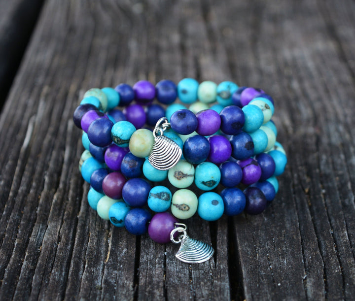 Acai Beads strung in memory wire making a beautiful wrap around the arm natural bead bracelet.