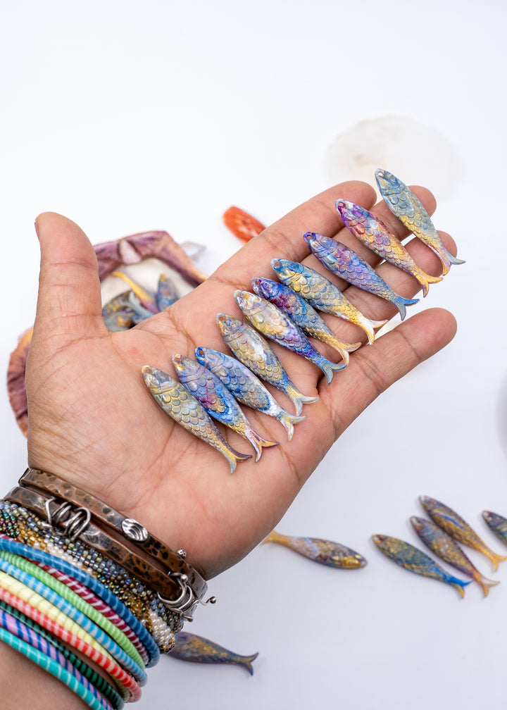 Ocean Aurora German Resin Fish Charm featuring a realistic 48mm sardine pendant. Perfect for ocean charms, beach jewelry, fisherman aesthetic accessories, coastal jewelry, nautical designs, handmade earrings, necklaces, keychains, and artisan jewelry making.
