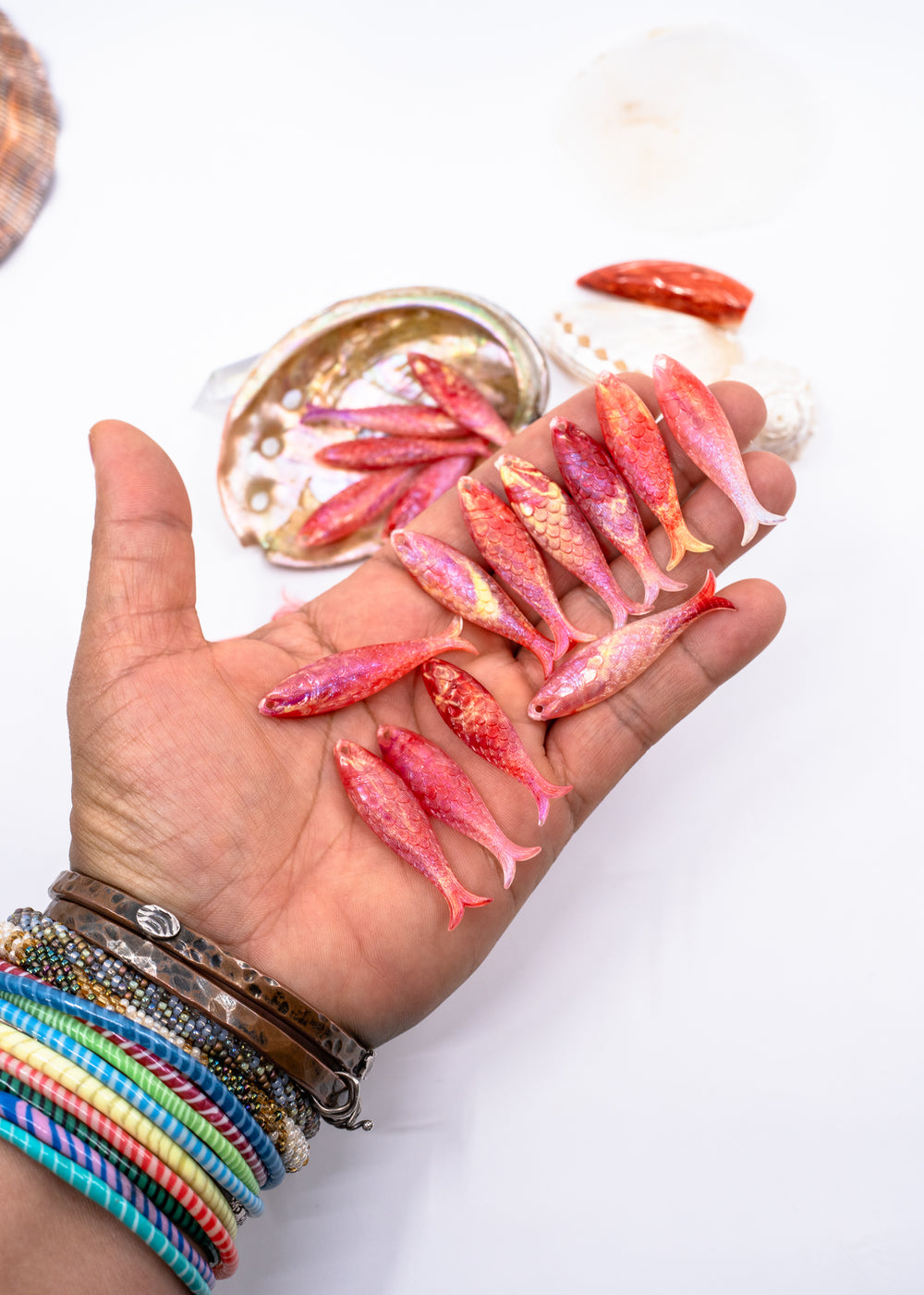 Pink mermaid glitter fish charms handmade from German resin featuring iridescent sardine pendants in coral and magenta tones. Perfect for ocean jewelry, mermaidcore accessories, coastal earrings, beach fashion, whimsical summer jewelry, and playful statement designs.