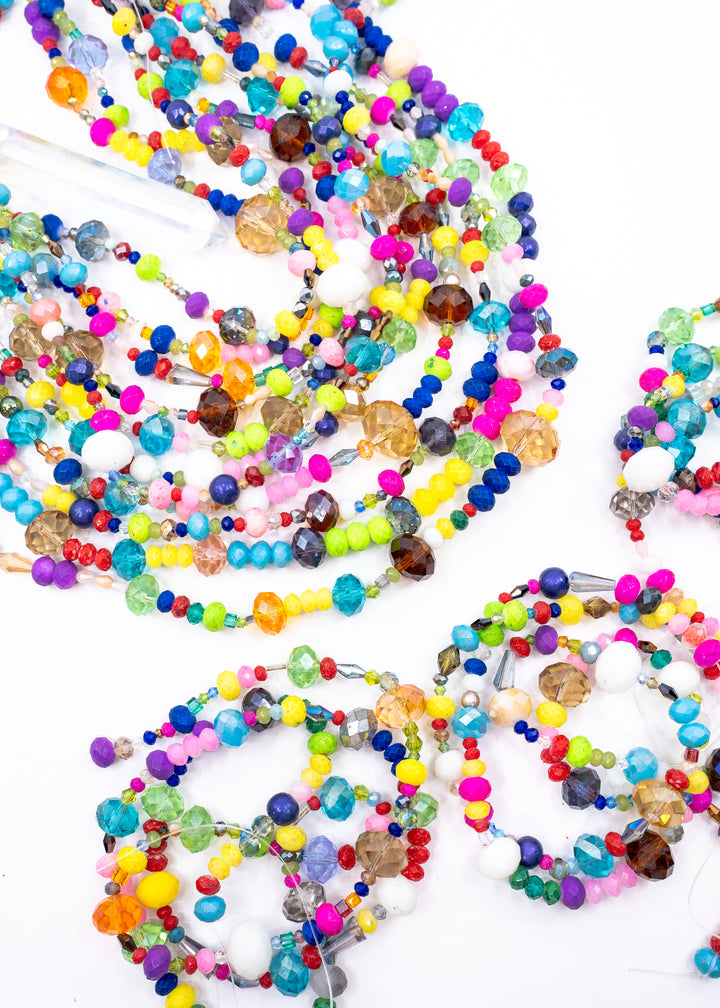 Rainbow Sparkle Acrylic Beads reflecting sunlight with colorful faceted acrylic beads
