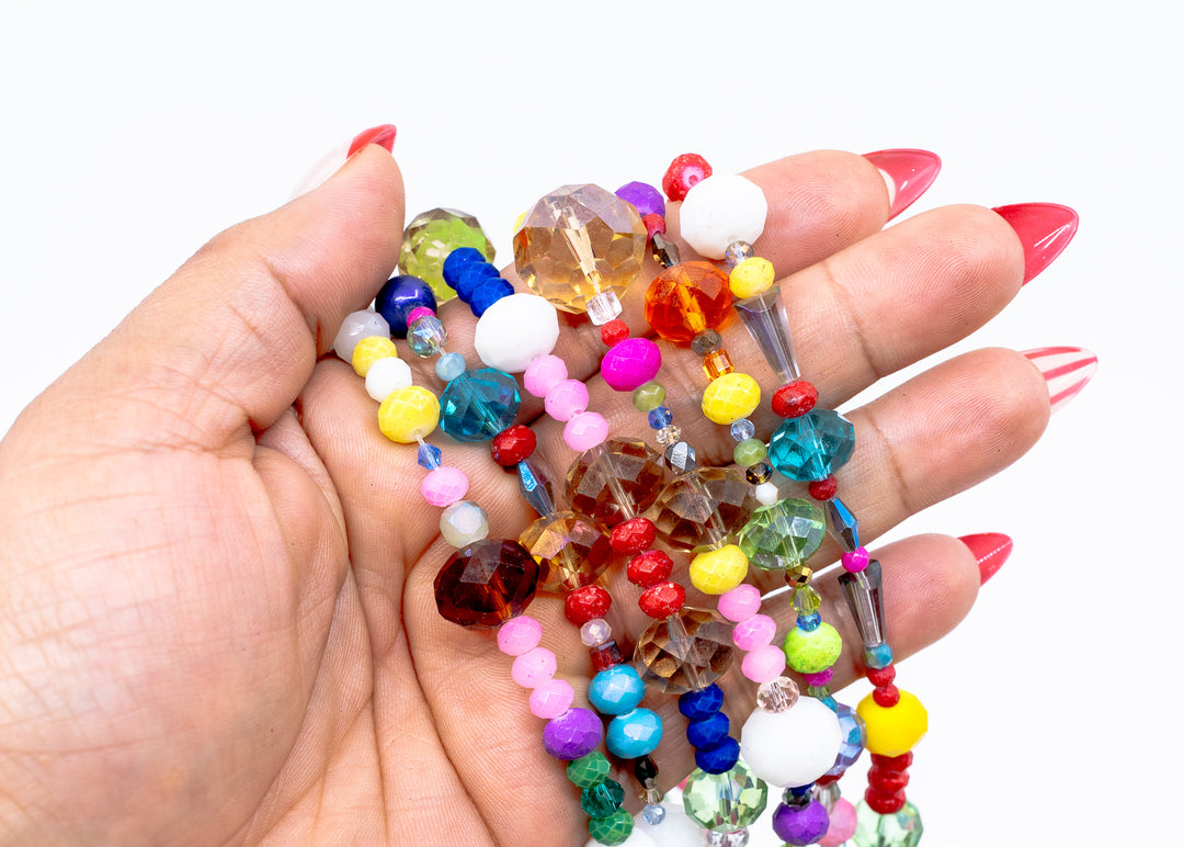 Rainbow Sparkle Acrylic Beads featuring assorted faceted acrylic beads in bright rainbow colors on a 16 inch strand for jewelry making, bracelets, sun catchers, and craft projects