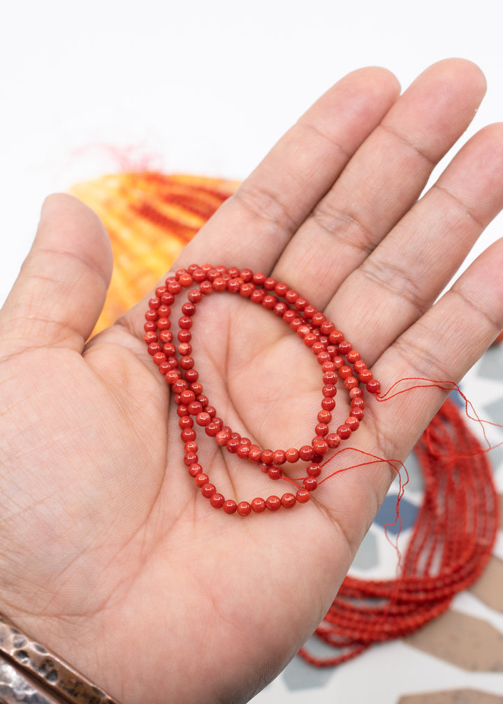 Tiny Red Bamboo Coral Beads (dyed), 2-3mm Round, 16" strand