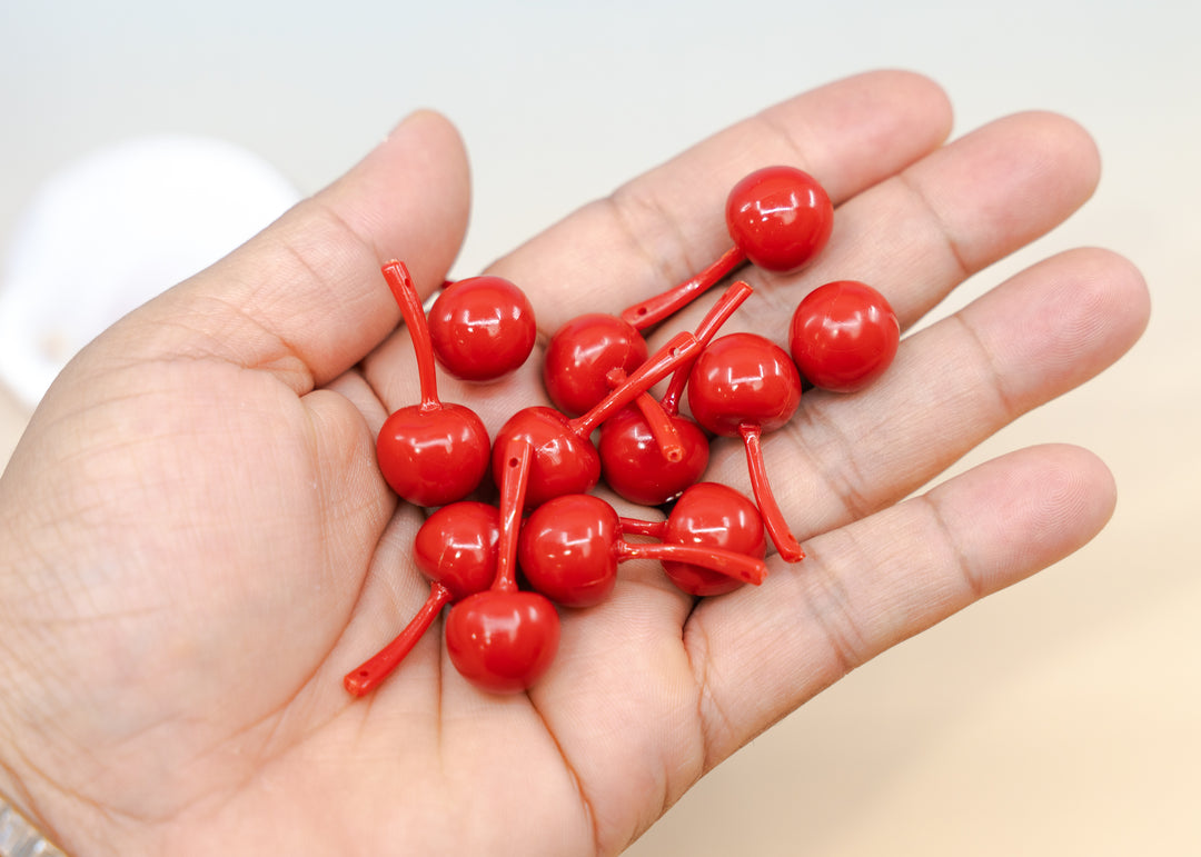 Shop Red Cherry German resin beads, 31mm lightweight kitschy fruit beads for cherry earrings, statement jewelry and colorful DIY accessories.