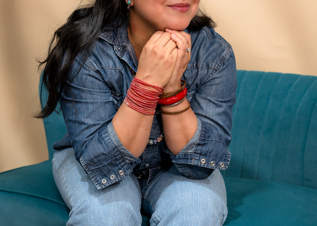 Red and white recycled flip flop bracelets handmade in Mali, West Africa featuring lightweight waterproof bangles perfect for boho arm stacks, beach jewelry, festival fashion, layered bracelets, artisan gifts, and colorful summer accessories.