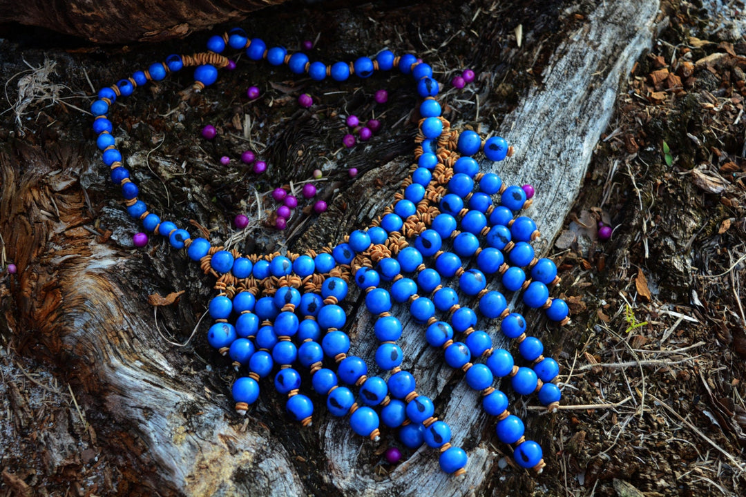 A beautiful handmade Blue Acai Beads necklace with natural beads, handmade jewelry.