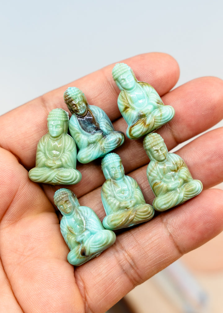 Shop a Lagoon Driftwood Buddha pendant in 25mm marbled resin. Lightweight sitting Buddha charm for necklaces, malas, meditation and spiritual jewelry.