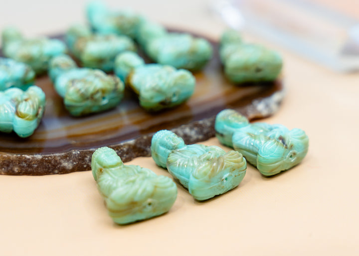 Shop a Lagoon Driftwood Buddha pendant in 25mm marbled resin. Lightweight sitting Buddha charm for necklaces, malas, meditation and spiritual jewelry.