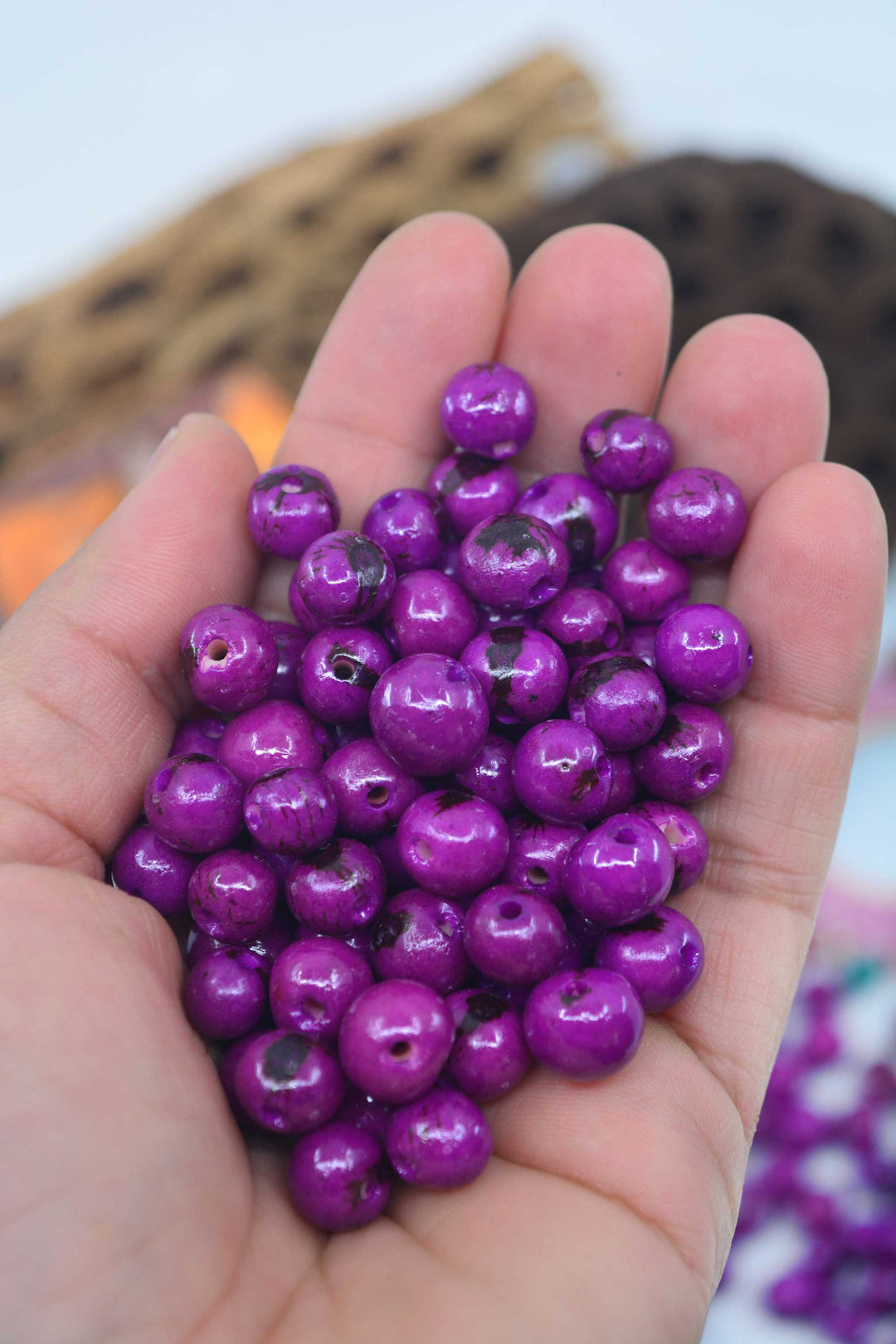close-up of purple acai beads for jewelry making