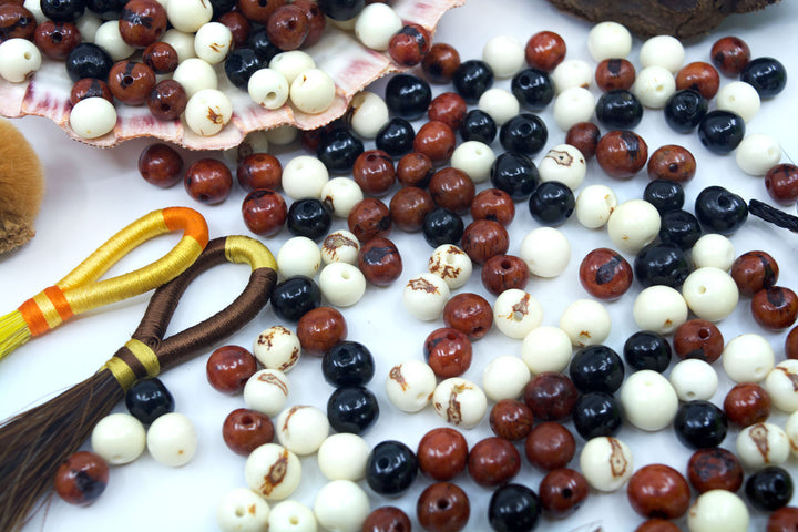 Cookies and Cream, Brown, White and Black Acai Beads assortment of beads.