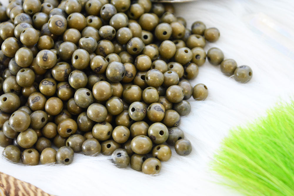 Dark Olive Green Acai Beads close-up showing the natural beads details.
