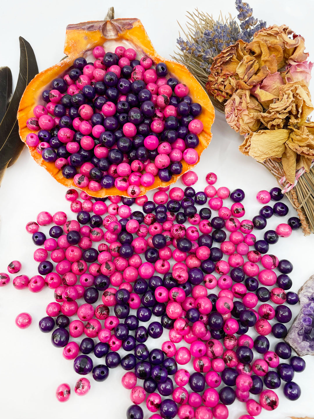 Electric Love, Pink and Purple Acai Beads displayed on a white background.