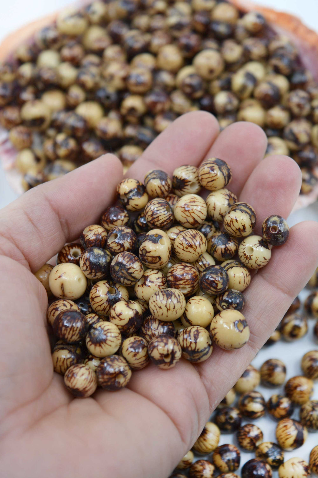 Natural Brown and Cream Real Acai Beads close-up of beads.