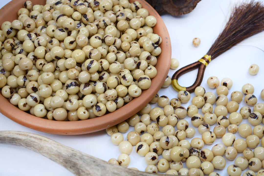 Natural Cream Real Acai Beads for eco-friendly jewelry making.