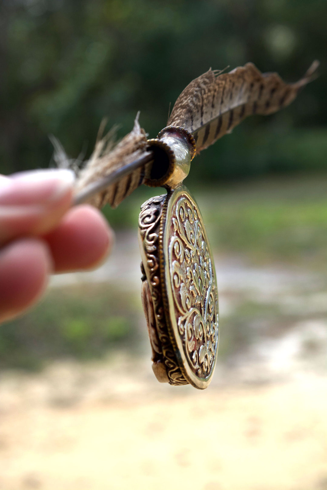 The Howling in Silver: 2 1/4 x 2 3/4 inches Handcarved in Bone, Buffalo Pendant set in Sterling Silver - OOAK